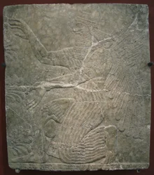 Geflügelte Gottheit am heiligen Baum. Relief aus dem Palast von Ashurnasirpal II. in Kalhu, Nimrud