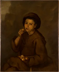 Junge beim Essen von Pfirsichen