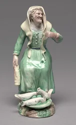 Alte Frau füttert Hühner, Staffordshire Fabrik, ca. 1770