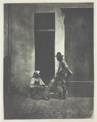 Pifferaro stehend und italienische Bäuerin sitzend, im Hof des 21 Quai Bourbon