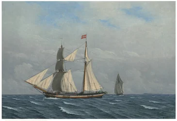 Ein Segelboot mit vollen Segeln