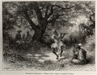 Begegnung mit zwei Griots: Kapitän Binger sitzt im Schatten und genießt die Darbietung. Stich von Riou zur Illustration des Berichts „Vom Niger bis zum Golf von Guinea“ von Kapitän Louis Gustave Binger (1856-1936), 1887-1889, in „Le Tour du monde, nouveau