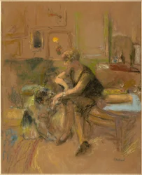 Gabrielle Jonas spielt mit einem Hund