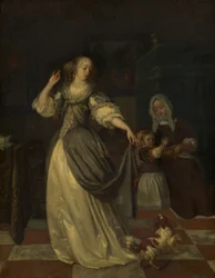 Dame spielt mit einem Hund