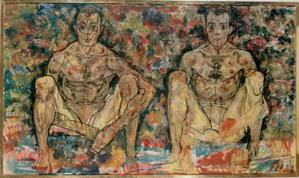 Hockendes Männerpaar