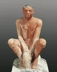 Ägyptische Zivilisation, bemalte Kalksteinfigur eines Mannes, der Ton modelliert, aus Saqqara, Ägypten, ca. 2465 v. Chr.
