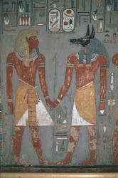 Pharao und Anpu halten sich an den Händen
