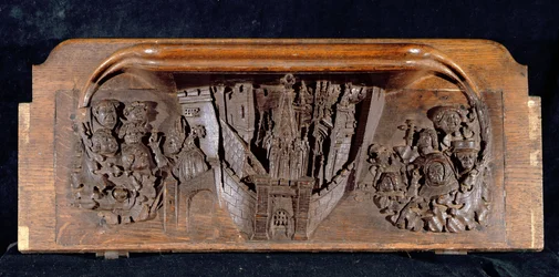 Eine Miserikordie, die eine ummauerte Stadt mit einem Tor und hochgezogenem Fallgitter darstellt, New College Chapel, Oxford, spätes 14. Jahrhundert