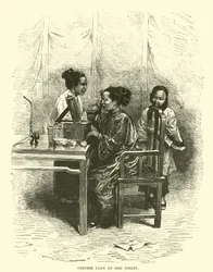 Chinesische Dame bei ihrer Toilette