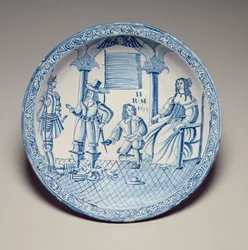 Schale mit Königin Katharina, die von einem knienden Kavalier einen Schuh angepasst bekommt, 1677 (zinnverglaste Irdenware)
