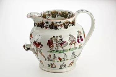 Staffordshire Krug mit Harlekinfiguren und Karnevalsthema dekoriert, 1866