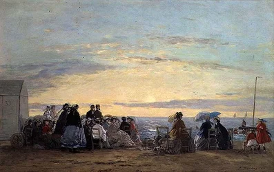 Den Sonnenuntergang vom Strand aus beobachten