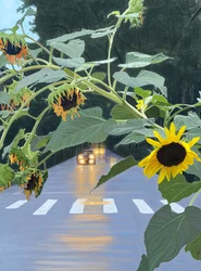 Sonnenblumen und Autos auf baumgesäumter Straße bei Morgendämmerung