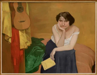 Sitzende brünette Frau von vorne, mit Gitarre