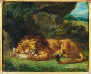 Löwe, der einen Hasen verschlingt