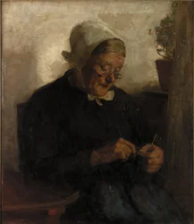 Alte Frau beim Stricken