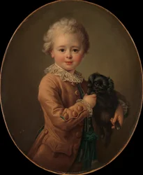 Junge mit einem schwarzen Spaniel