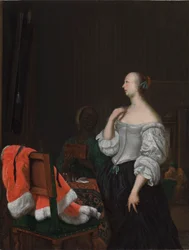 Eine Frau vor einem Spiegel