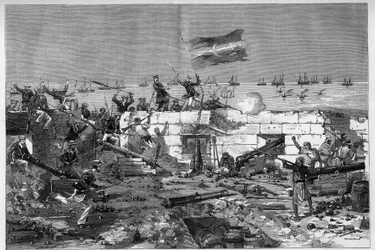 Tunesien, Juli 1881: Französische Truppen eroberten die Stadt Stax nach dem Aufstand der Einwohner gegen das französische Protektorat von Tunesien. Marinegewehre nehmen die Rundbatterie ab. Gravur von De Haenen in „Die illustrierte Welt“ Nr. 1273 vom 20. A