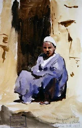 Ein sitzender Junge in einem Tempel in Philae