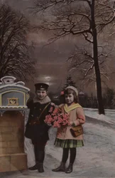 Junge und Mädchen im Schnee, kurz vor dem Einwerfen eines Briefes