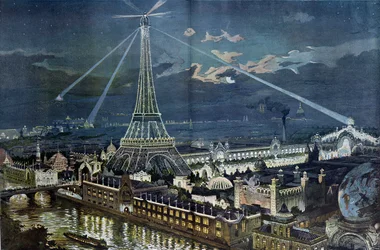 Die Illuminationen des Palais du Champ-de-Mars mit den auf dem Eiffelturm angebrachten Scheinwerfern während der Pariser Weltausstellung