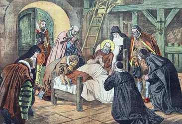 Der Tod des Heiligen Franz von Sales am 18. Dezember 1622 in Lyon, umgeben von Gläubigen. "Le pelerin" vom 31.12.1922