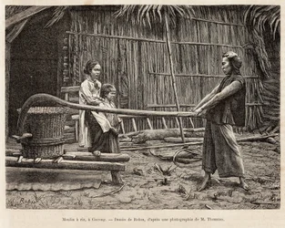 Die Reismühle vor dem Haus eines Bauern in Gocong, Gravur nach einer Zeichnung von Robin, die die Reise nach Cochinchina, von Doktor Morice, im Jahr 1872 illustriert, veröffentlicht in „Le tour du monde“ 1875, herausgegeben von Edouard Charton, Hachette Ed