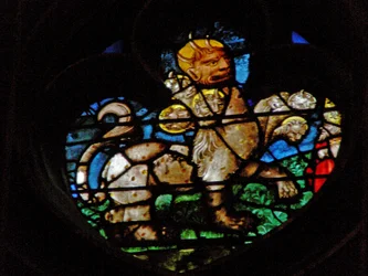 Das Westrosenfenster zeigt eine Szene aus dem Buch der Offenbarung: Tier.