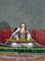 Türkisches Mädchen spielt ein Tasteninstrument, aus Collection of One Hundred Prints Representing the Different Nations of the Levant von Charles de Ferriol, graviert von Gerard Scotin (1671-1716)