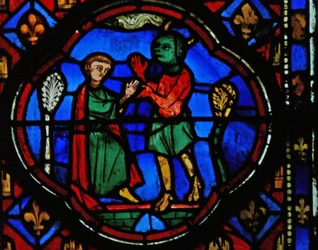 Fenster Ew-R, Theophilus mit einem Teufel darstellend