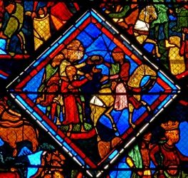 Fenster w24 zeigt eine Szene aus der Geschichte von Joseph: seine Brüder mit ihrem Vater Jakob