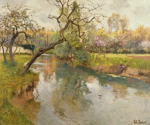Französische Flusslandschaft mit blühendem Baum