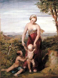 Eine Frau mit zwei Kindern in einer hügeligen Landschaft