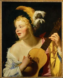 Femme jouant de la guitare