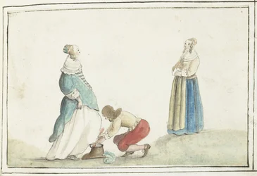 Herr bindet den Schuh einer Dame