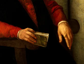 Vermutetes Porträt von Francois Rabelais (1494-1553), französischer Schriftsteller und Arzt. Detail des Buches, das er in der Hand hält, und des Ritters, den er am Finger trägt. Gemälde von Giovanni Battista Moroni (1525-1578)