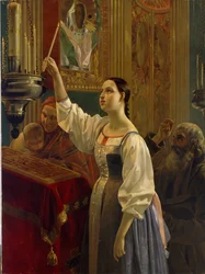 Mädchen stellt eine Kerze vor eine Ikone. In einer orthodoxen Kirche am Gründonnerstag der Osterwoche.