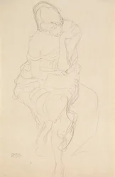 Auf einem Hocker Sitzende von vorne