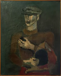 Junger Mann mit Sixpence-Mütze