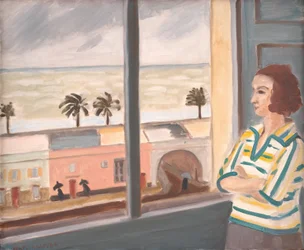 Junge Frau mit Blick auf das Meer, stürmisches Wetter