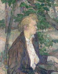 Frau im Garten sitzend