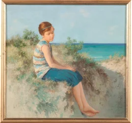 Mädchen in den Dünen am Nordseestrand auf Sylt