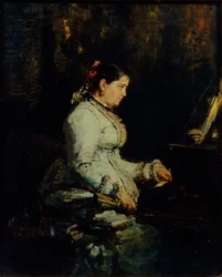 Frau am großen Klavier