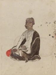 Figur eines sitzenden Mannes