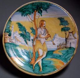 Renaissancekunst: mit einem Flötenspieler verzierter Teller (Ein Flötenspieler) - Ende des 16. Jahrhunderts. Hergestellt in Viterbo (Viterbo), Italien. Florenz, Museo Nazionale del Bargello