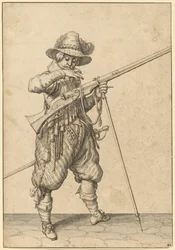 Ein Soldat auf Wache, der das Streichholz bläst