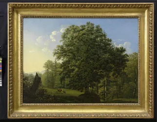 Landschaft mit weidenden Kühen