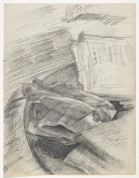 Papiere und Bücher auf einem Tisch angeordnet