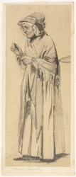 Alte Frau mit Schal und Mütze